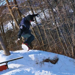 Snowboarder doing a jump