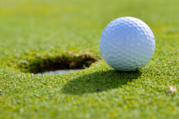 golf ball near the hole