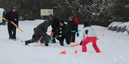 team building activity in the snow