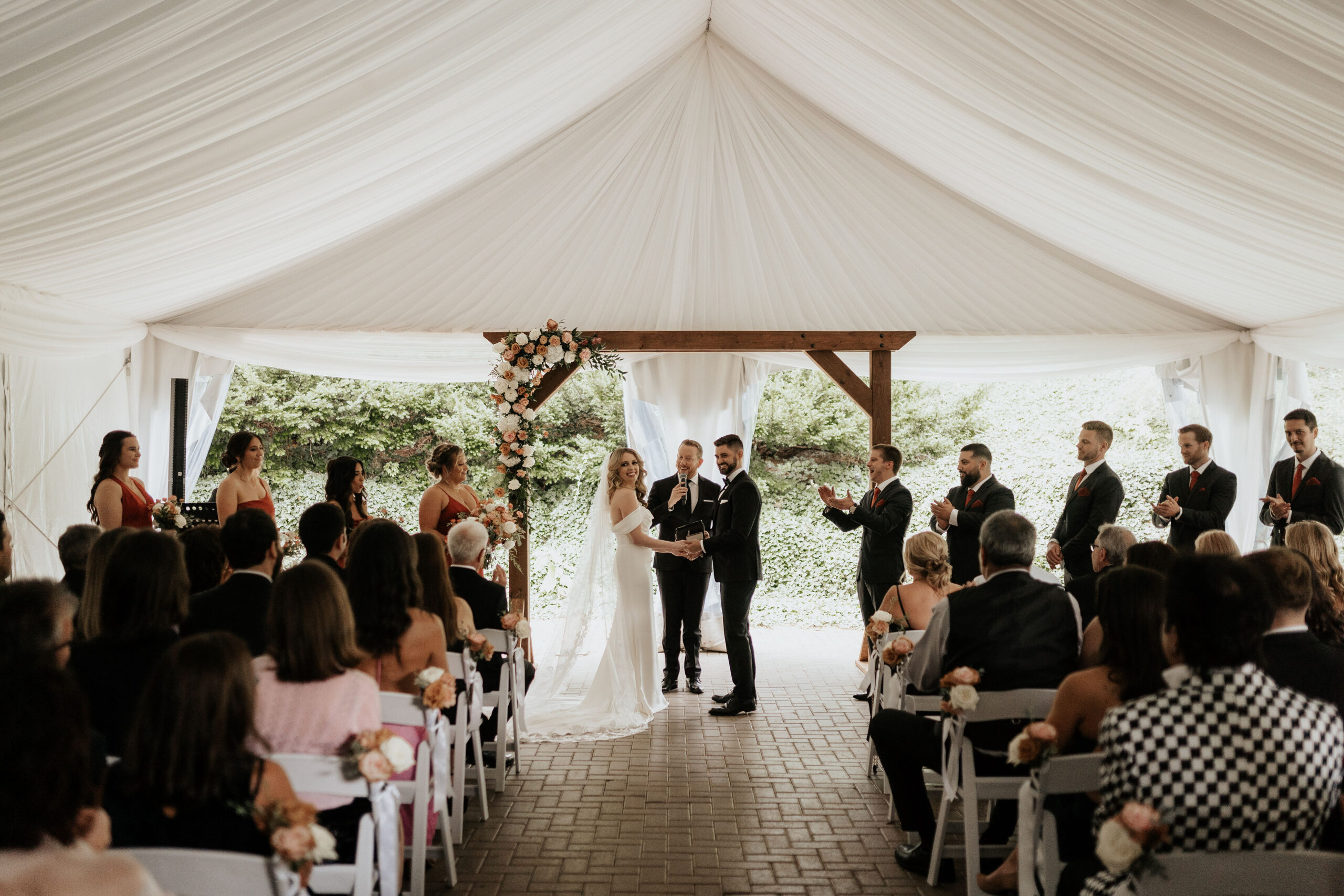 bride and groom at the alter